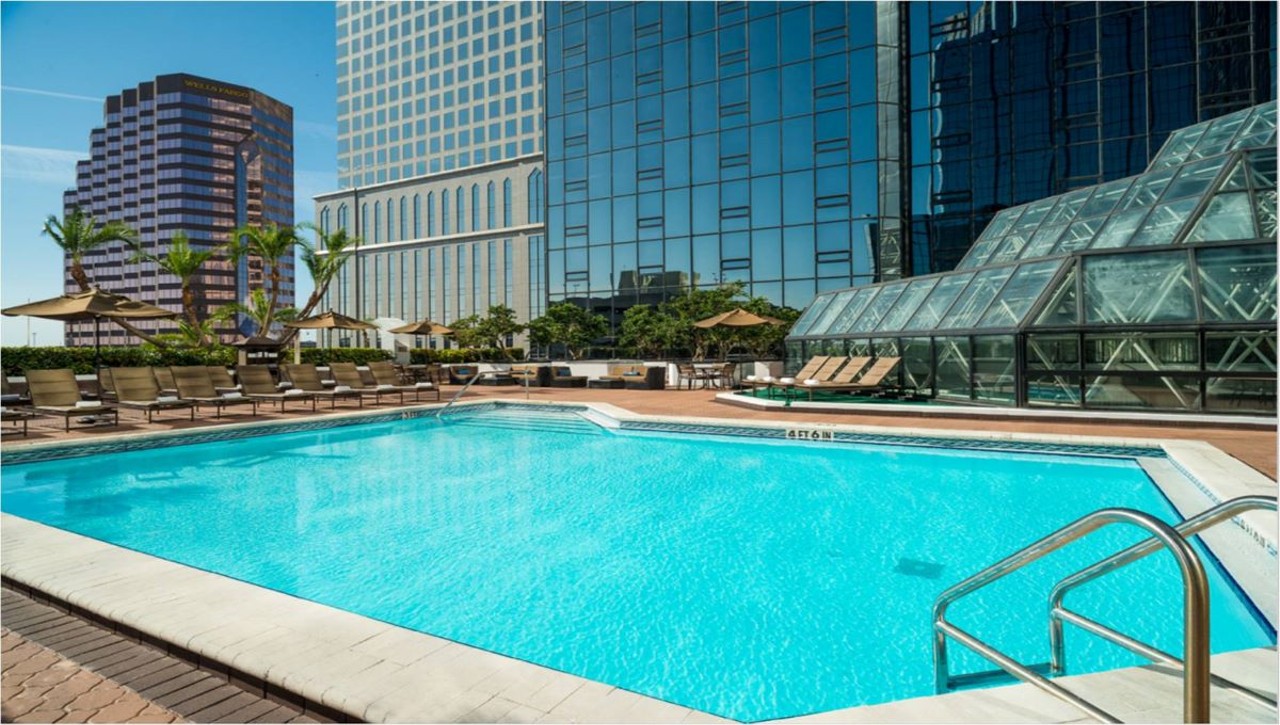 Hilton Tampa Downtown
211 N Tampa St., Tampa, 813-204-3000    
$20
For $20, guests have access to Hilton Tampa Downtown’s rooftop pool, fitness center and whirlpool hot tub, with amenities like poolside food and drink service and free Wi-Fi. Entry is free for infants. Park at the hotel using valet for $37, or use hourly self-parking at the nearby Fort Brooke parking garage. 
Photo via Hilton Tampa Downtown/Facebook