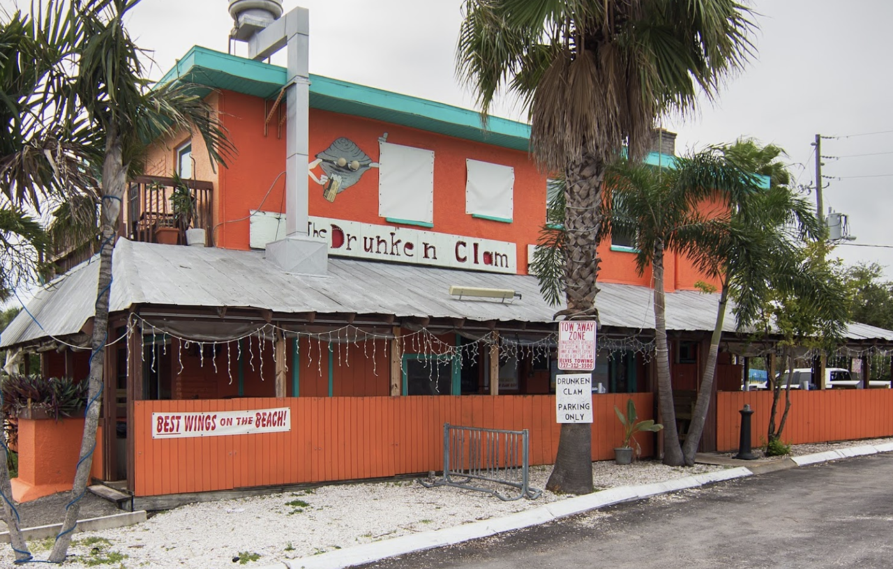 The Drunken Clam  
46 46th Ave., St Pete Beach, 727-360-1800
This bar does not allow smoking indoors, but it does offer a small kitchen that pumps out a lot of food. From cajun parmesan garlic wings to fresh steamed clams, this is the perfect spot to get boozy and grab a bite.
Photo via The Drunken Clam/Facebook