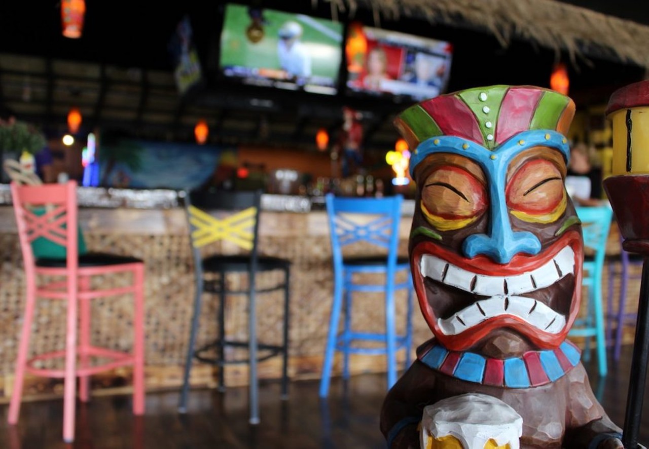 Twisted Tiki
340 Corey Ave., St. Pete Beach, 727-914-8881
Located on St. Pete Beach’s historic Corey Avenue, Twisted Tiki is another lively Polynesian bar and grill that proudly serves happy hour specials “all day, every day.” Food options include loaded tots, creamy crab dip, build-your-own burgers, teriyaki-stuffed pineapples. With performances from local bands, trivia night, art night and more, there’s something going on at this vibrantally-spirited spot almost every night. 
Photo via Twisted Tiki/Facebook