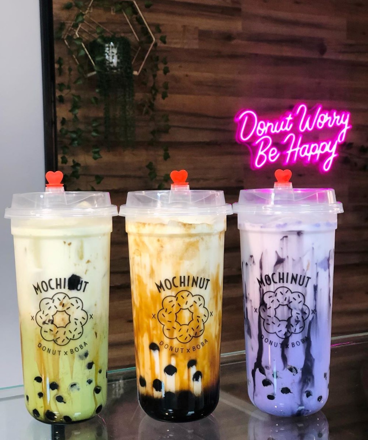 Mochinut
Locations in Pinellas Park & Temple Terrace
While there’s dozens of these franchised chains throughout the country, Mochinut’s Tampa Bay storefronts still sling boba comparable to other local cafes. Some come for the rotating flavors of mochi doughnuts and Korean-style, cheese-stuffed corn dogs, while others gravitate towards its ube, matcha or brown sugar milk teas. 
Photo via Mochinut/Facebook