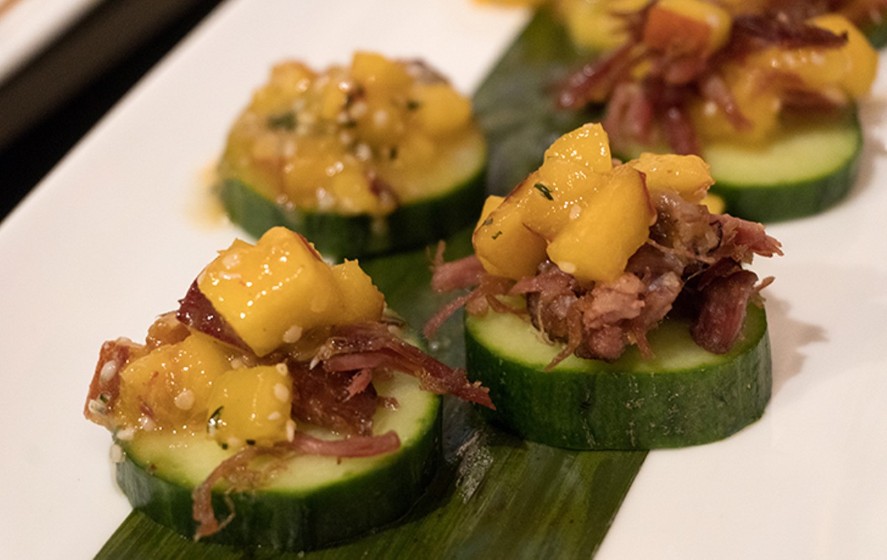 Another Tinling hors d'oeuvre featured cucumber slices topped with pulled pork, chunks of mango, and sesame seeds.
Photo by Jennifer Ring