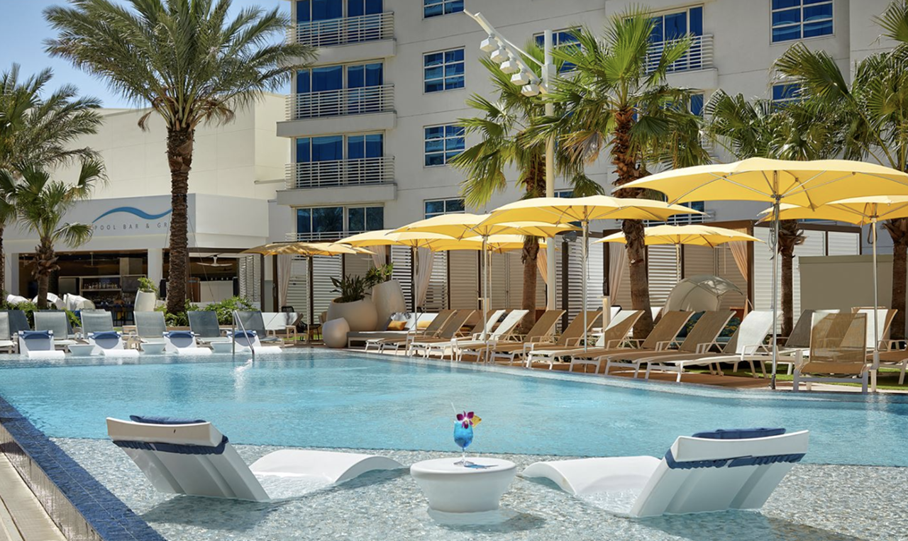 Seminole Hard Rock Hotel & Casino Tampa
5223 Orient Rd, Tampa, 866-388-4263    
$25-$500
For $25 on weekdays and $40 on weekends, guests can make the most of the Seminole Hard Rock’s three diverse pools, its 500 lounge chairs and daybeds, DJ booths and food and drink service. Standard cabanas for 8 are $350, or you can ball out in true Hard Rock style with a $500 VIP cabana. Self-parking is $20 for 12 hours. 
Photo via Seminole Hard Rock & Casino/Google