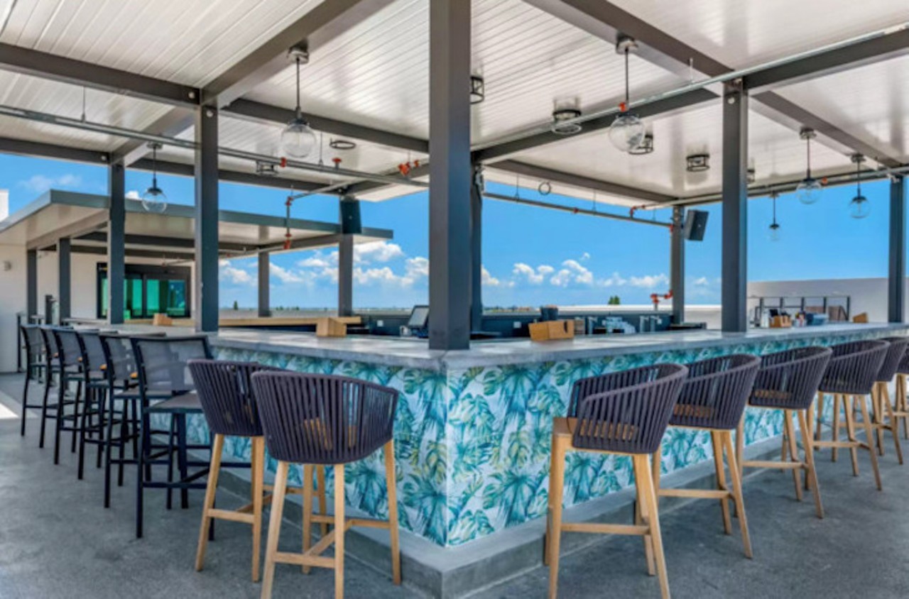 Ember Rooftop Lounge at Cambria Hotel  
15015 Madeira Way, Madeira Beach
The newbie is located within the just-opened five-story Cambria Hotel at the Madeira Beach Marina. Ember is pouring up wine by the glass and bottle, draft and bottled brews, and mixing up tropical cocktails named after local hotspots and beaches. The food and drink menu ranges from $10-$18 per dish.
Photo via Ember Rooftop Lounge at Cambria Hotel