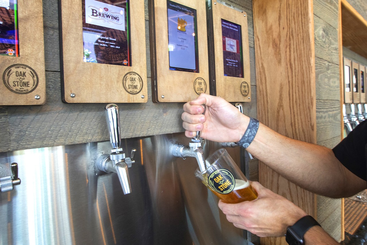 Oak & Stone showcases a gleaming array of 48 DIY craft beer taps.