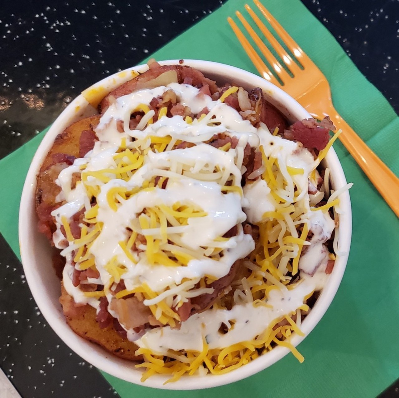 Classic Loaded Potato Bowl
A down-home medley of seasoned potatoes, crispy bacon, Cheddar and herb sour cream from Ma's Irish Kitchen.