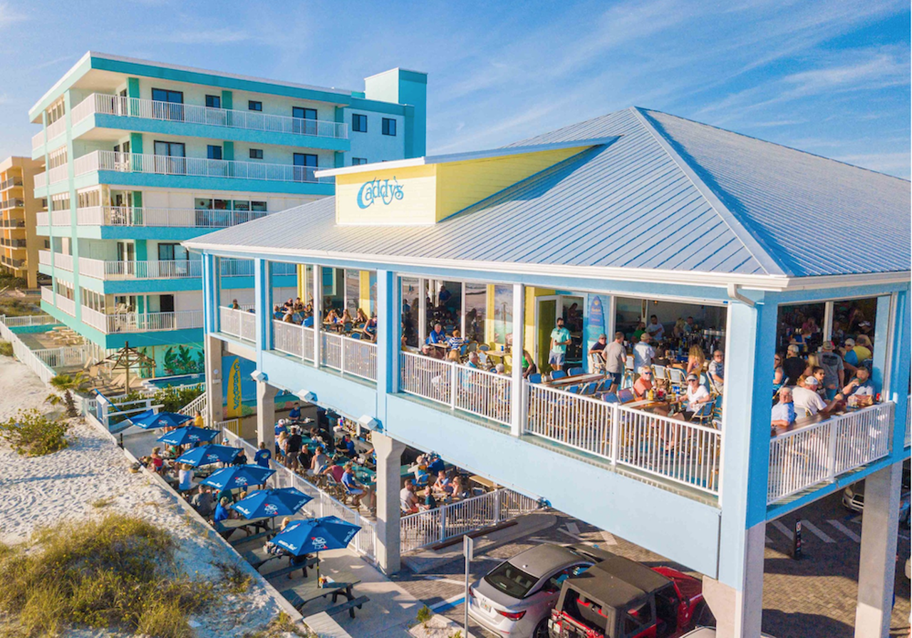 Caddy’s Madeira Beach
14080 Gulf Blvd., Madeira Beach, 727-308-7888
As one of Tampa Bay’s favorite dining chains, Caddy’s has a lot of expectations to uphold, and its waterfront locations do not disappoint. Have frozen drinks during Happy Hour, take a dip in the water and come back for more in one of the best beachfront restaurants on Florida’s West Coast.
Photo via Caddy’s Madeira Beach/Website