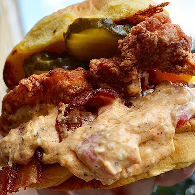 Flock and Stock    615 Channelside Dr, Tampa, FL     The &#147;Dixie Chick&#148; has maple bacon and pimento cheese, topped on their &#147;favorite bun.&#148; The sandwich also has the standard butter pickles, and the chicken is described as &#147;buttermilk chicken.&#148;     Photo via Flock and Stock/flockandstock.com