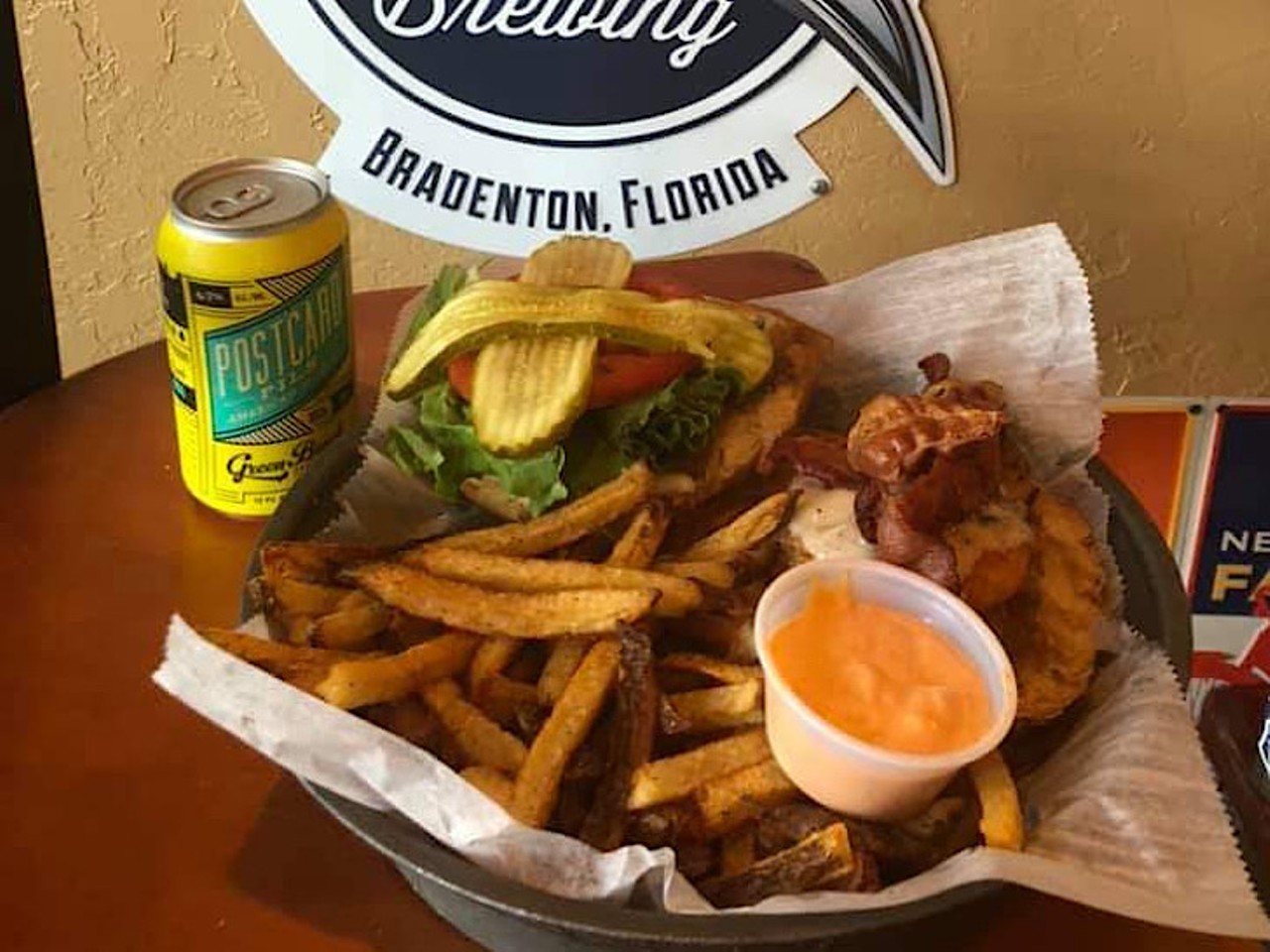 Burg Bar
1752 Central Ave, St. Petersburg, FL
The Burg Bar offers a buffalo chicken sandwich that has a beer-battered chicken breast tossed in buffalo sauce. Ranch dressing is then drizzled on, with lettuce and tomato. 
Photo via Burg Bar/Facebook