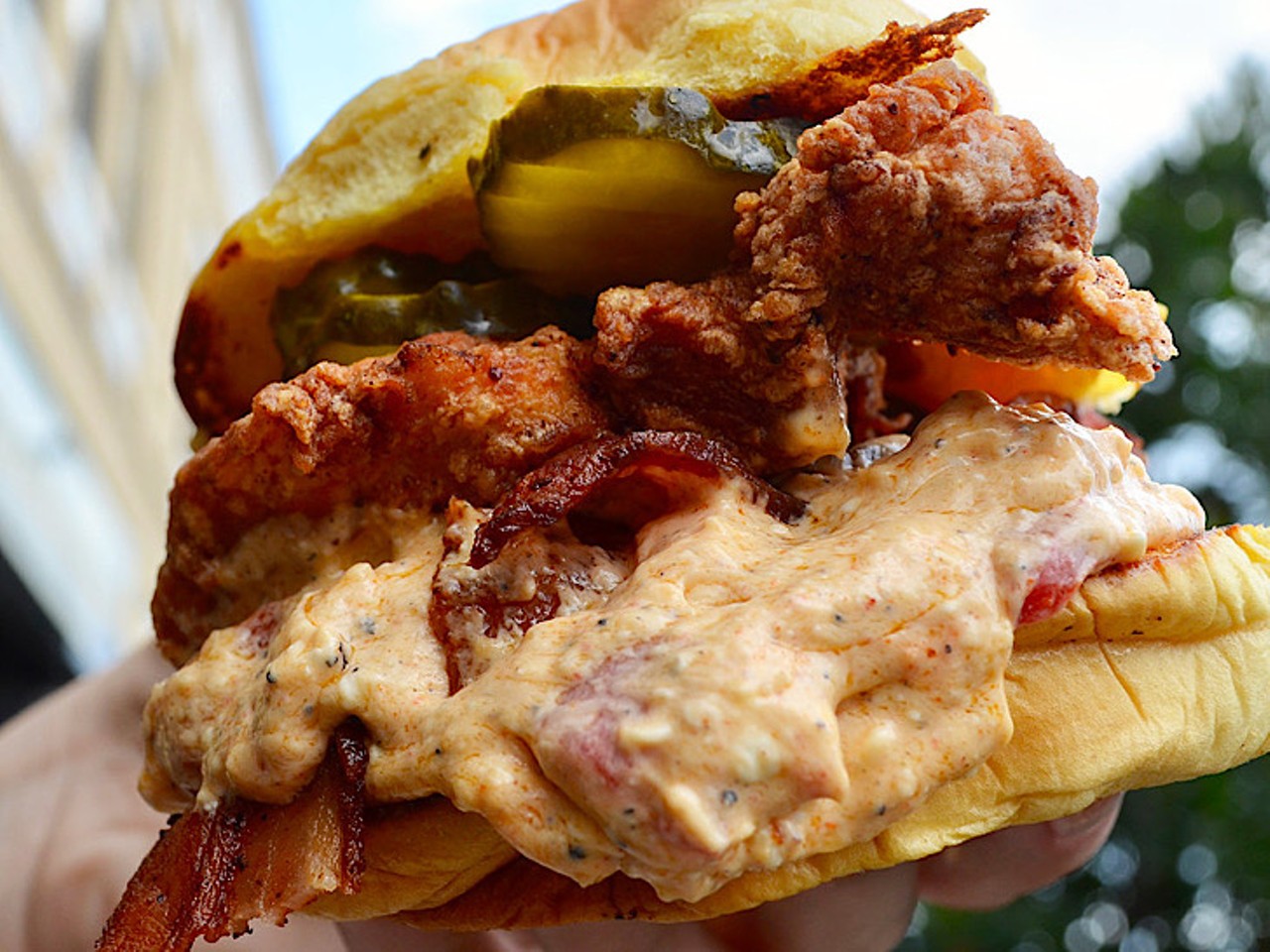 Flock and Stock
615 Channelside Dr, Tampa, FL
The &#147;Dixie Chick&#148; has maple bacon and pimento cheese, topped on their &#147;favorite bun.&#148; The sandwich also has the standard butter pickles, and the chicken is described as &#147;buttermilk chicken.&#148; 
Photo via Flock and Stock/flockandstock.com