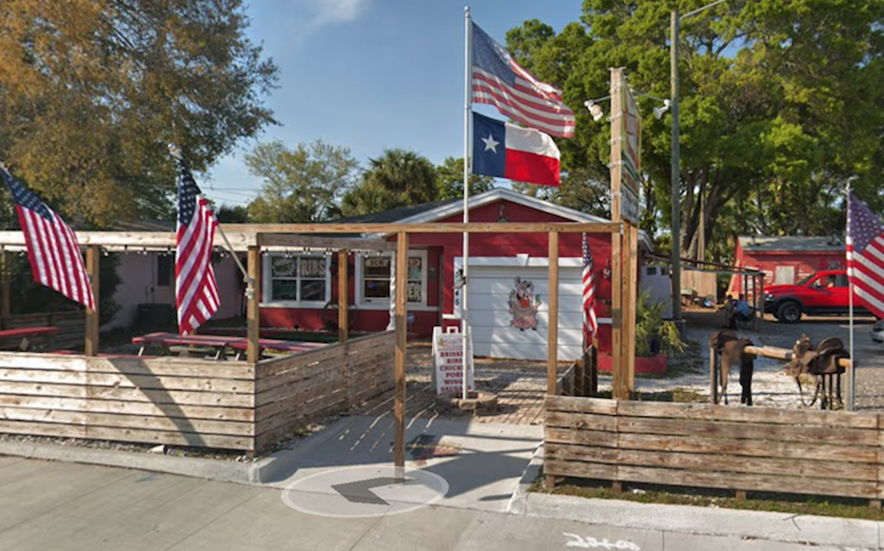 Smokin' J's BBQ
5145 Gulfport Blvd. S., Gulfport, 727-329-8624
One look at Smokin&#146; J&#146;s and you know exactly what you&#146;re in for - some real Texas BBQ. American and Texan flags jut out toward the street from the corral-like fence that surrounds a few picnic tables and the red and white restaurant. Inside the frills free dining room, owner John Riesebeck is serving up his competition-honed Texas BBQ staples like staples like pulled pork, brisket and baby back ribs.
Photo via Google Maps