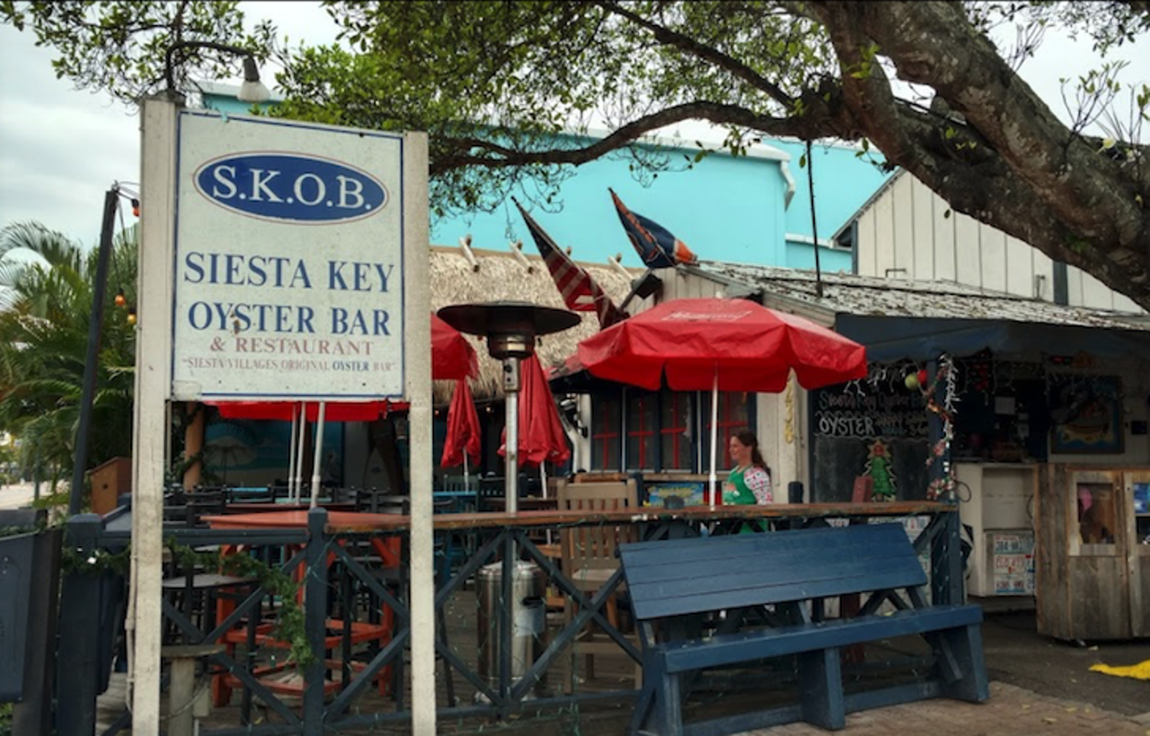 Siesta Key Oyster Bar  
5238 Ocean Blvd, Sarasota, 941-346-5443
A destination spot, you'll want to spend the day with the beachy atmosphere with a patio ceiling covered in dollar bills. Tropical bites and booze can be savored while enjoying live music.
Photo via Google Maps