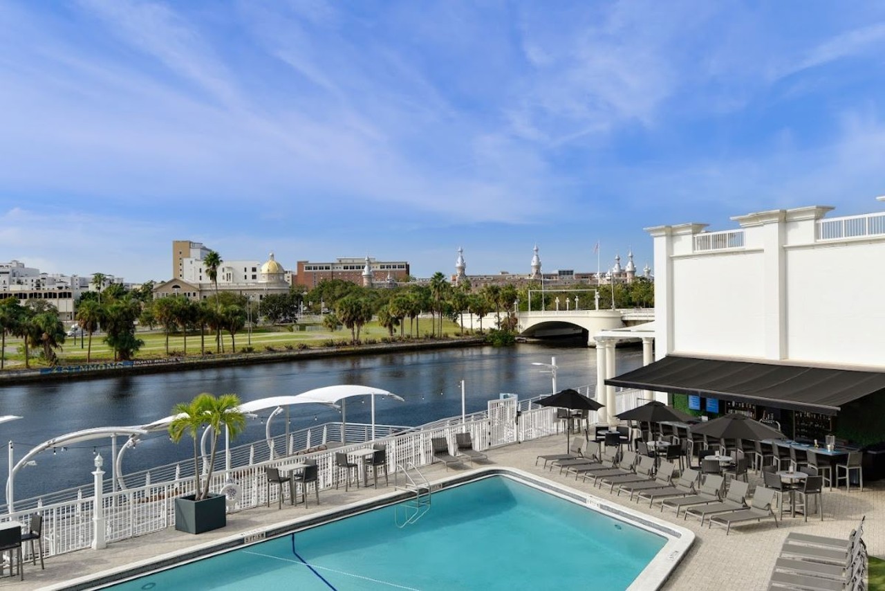 Hotel Tampa Riverwalk
200 N Ashley Dr., Tampa, 813-223-2222    
$20
Along Tampa’s Hillsborough River lies Hotel Tampa Riverwalk, where day passes are just $20. Get a quick workout at the fitness center before you hit the pool and bar. The hotel restaurant River’s Edge offers food and drink in addition to the poolside bar. Valet parking is discounted for day pass holders.
Photo via Hotel Tampa Riverwalk/Google