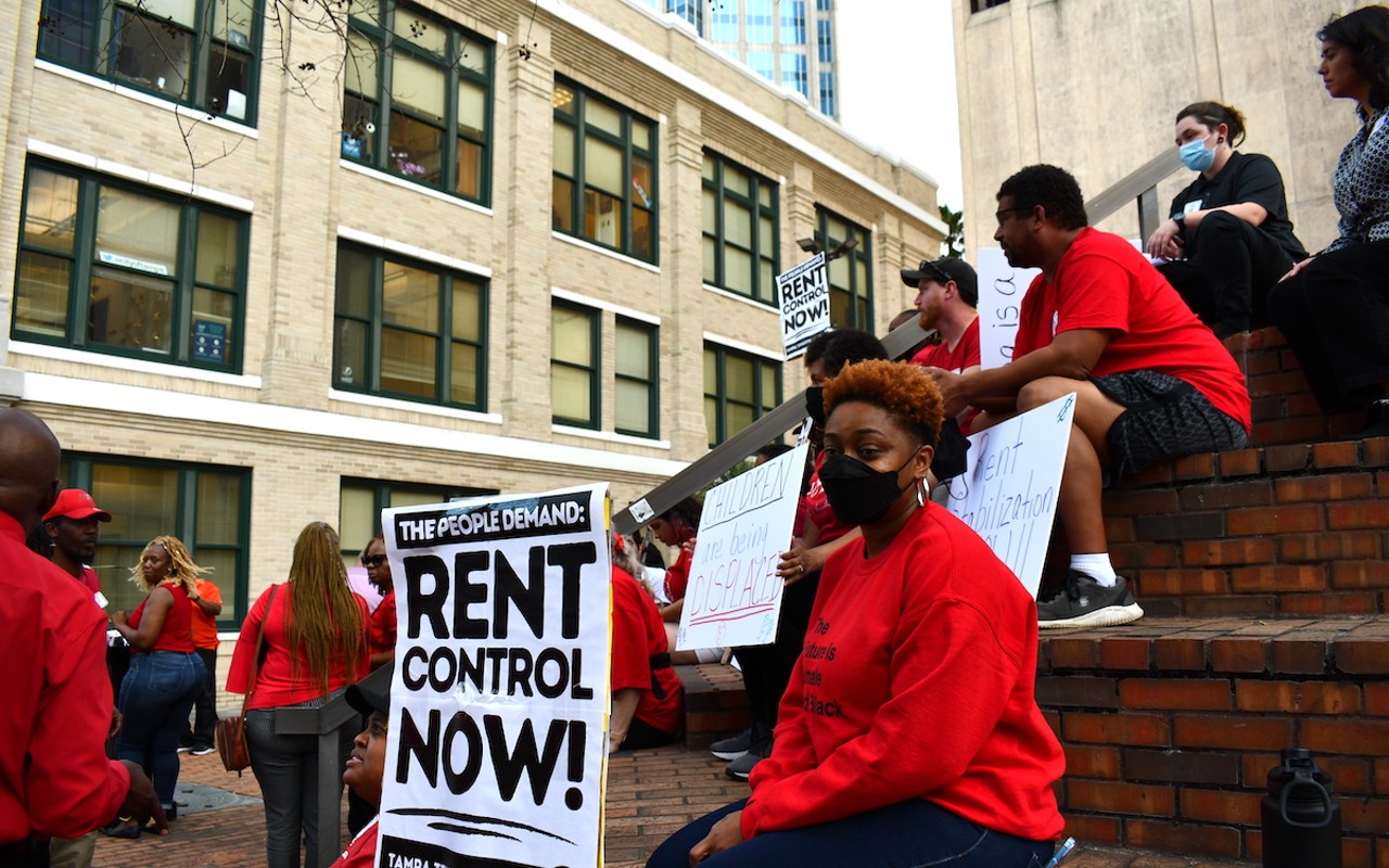 Protesters outside of Tampa City Hall demand rent control last March.