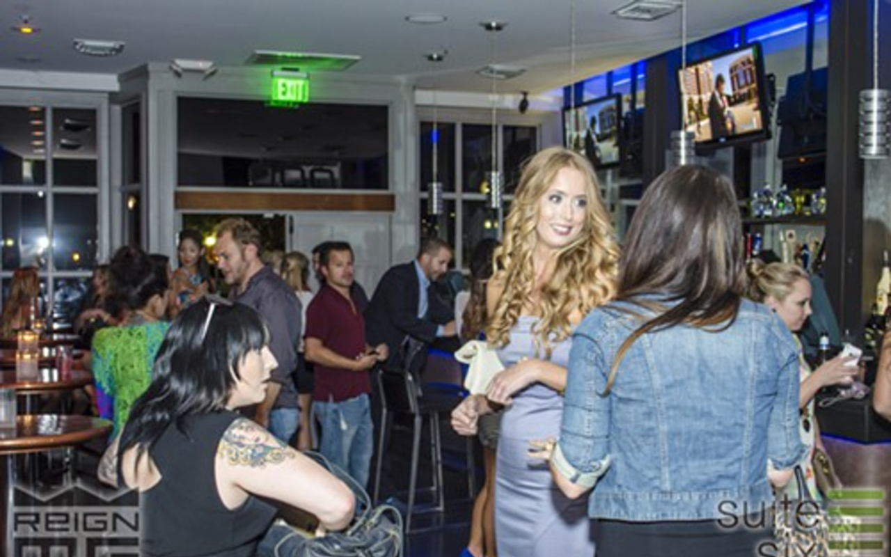 Guests mingle during the Fashion Forward event held at Suite Six Bar & Lounge on Thursday night. Fashion Forward was envisioned by Doug Hensel, co-owner of Suite Six, as a way of bringing local businesses together with potential customers in a fun and fashionable setting.