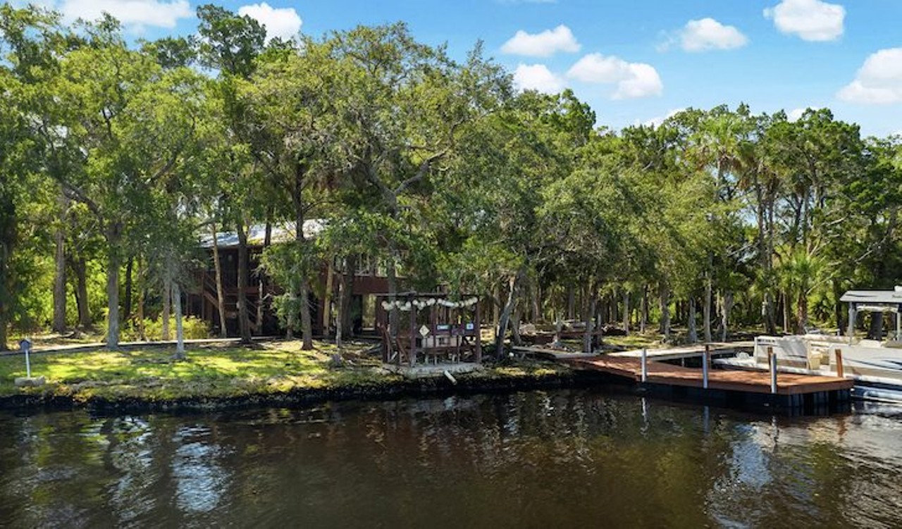 A river cabin on a private island near Tampa Bay is now for sale for $500K