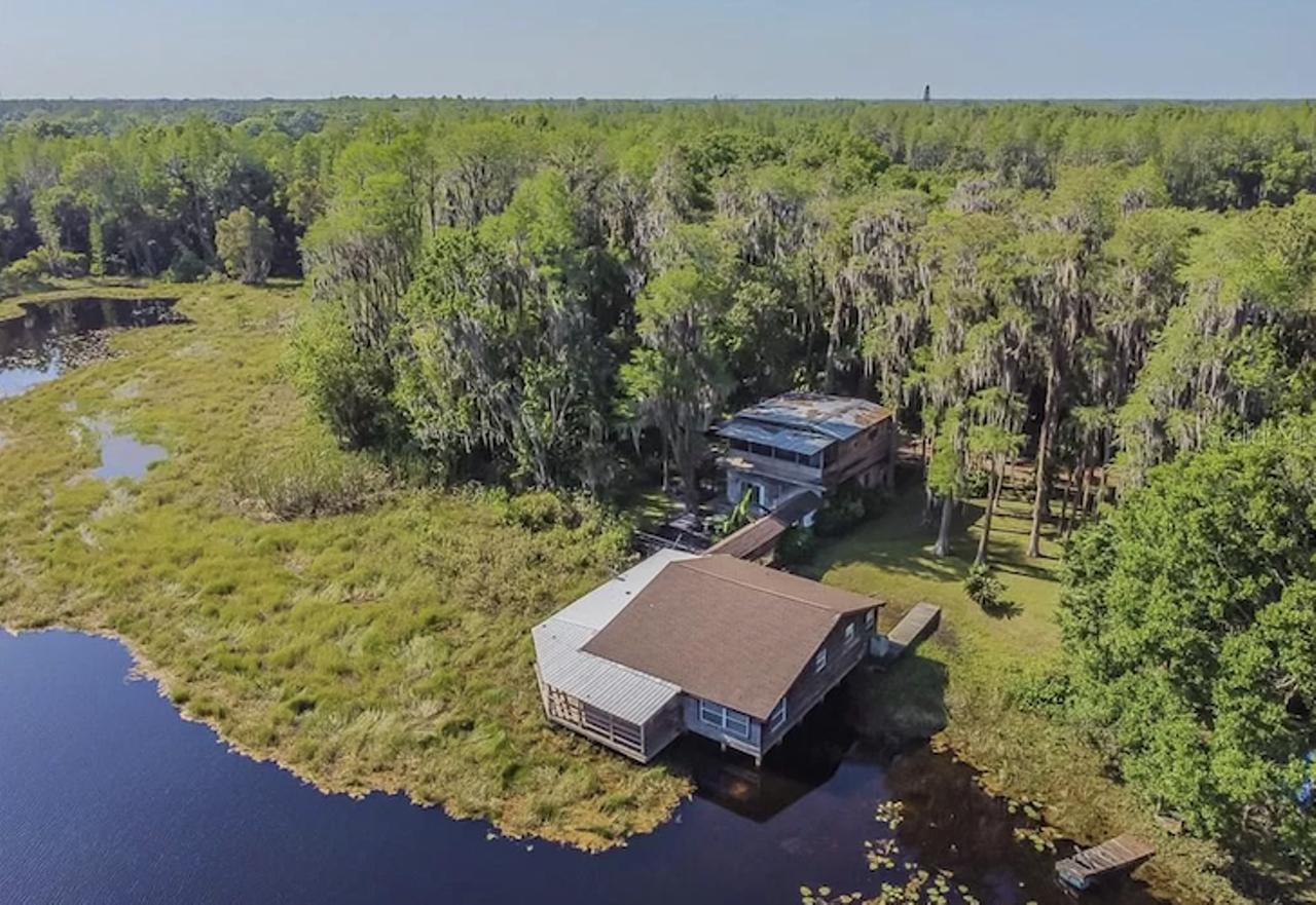 A Tampa Bay fishing cabin is on the market for $280K, and it sits 'over' a lake