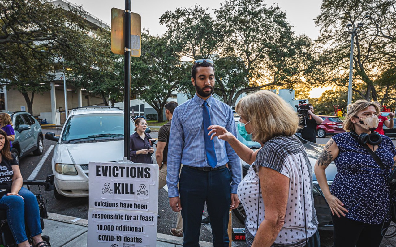 St. Petersburg City Councilman Richie Floyd speaks to a protester outside city hall in February 2022.
