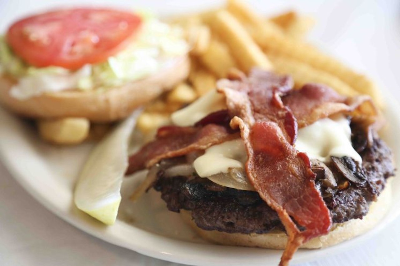 
Pesky Pelican
923 72nd St N, St., Petersburg
The Ultimate Pesky Pete Burger:  ⅓ lb. Angus beef patty covered in sautéed onions & mushrooms, white American cheese & smoked bacon. Dressed with lettuce, tomato and mayo, served with tortilla chips. ($16)
Photo courtesy of Pesky Pelican