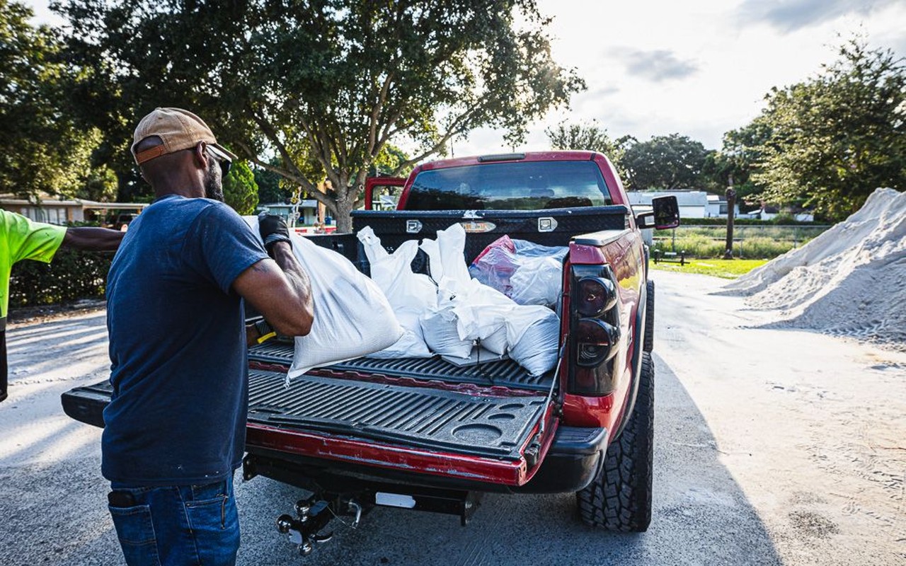 Tampa residents fill sand bags at Al Barnes Park