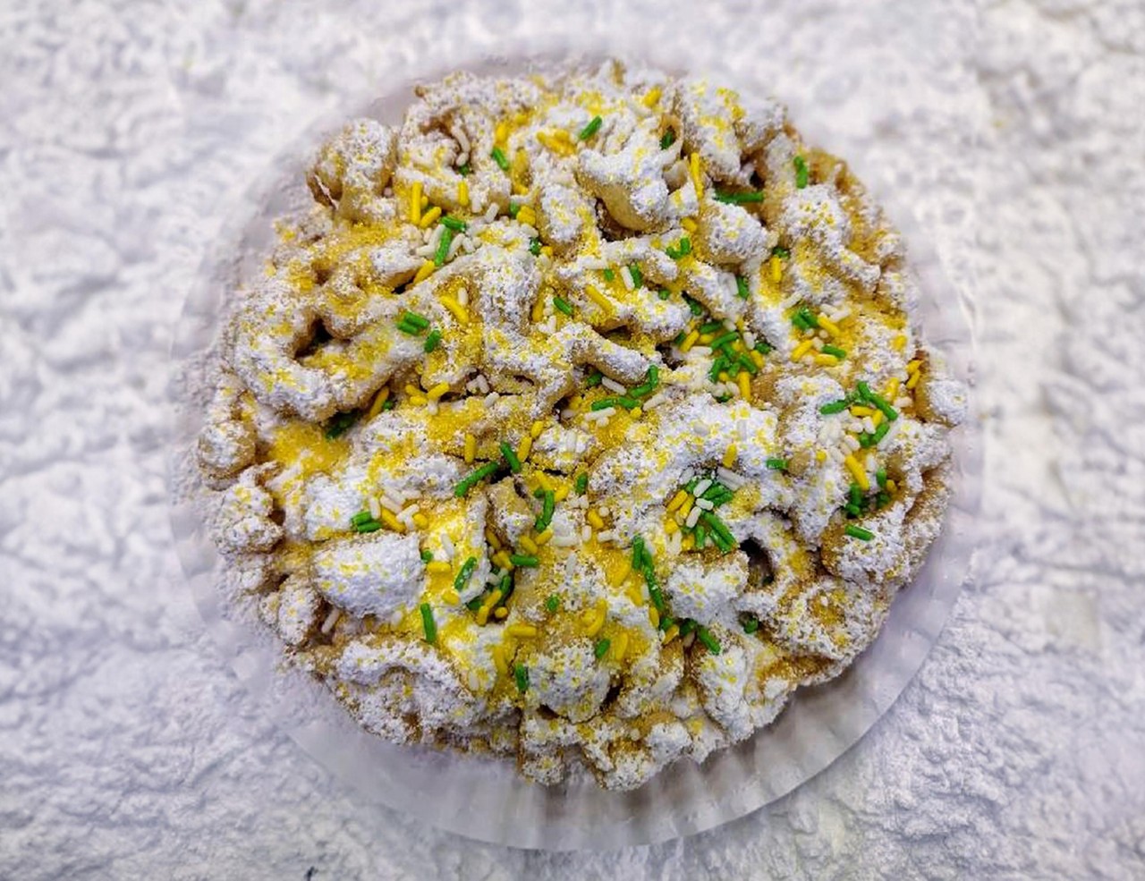 LEMONADE FUNNEL CAKE
Your FAIR FAVORITE with a new twist. Classic funnel cake with a sweet lemon flavored topping.
Topscan Funnel Cakes