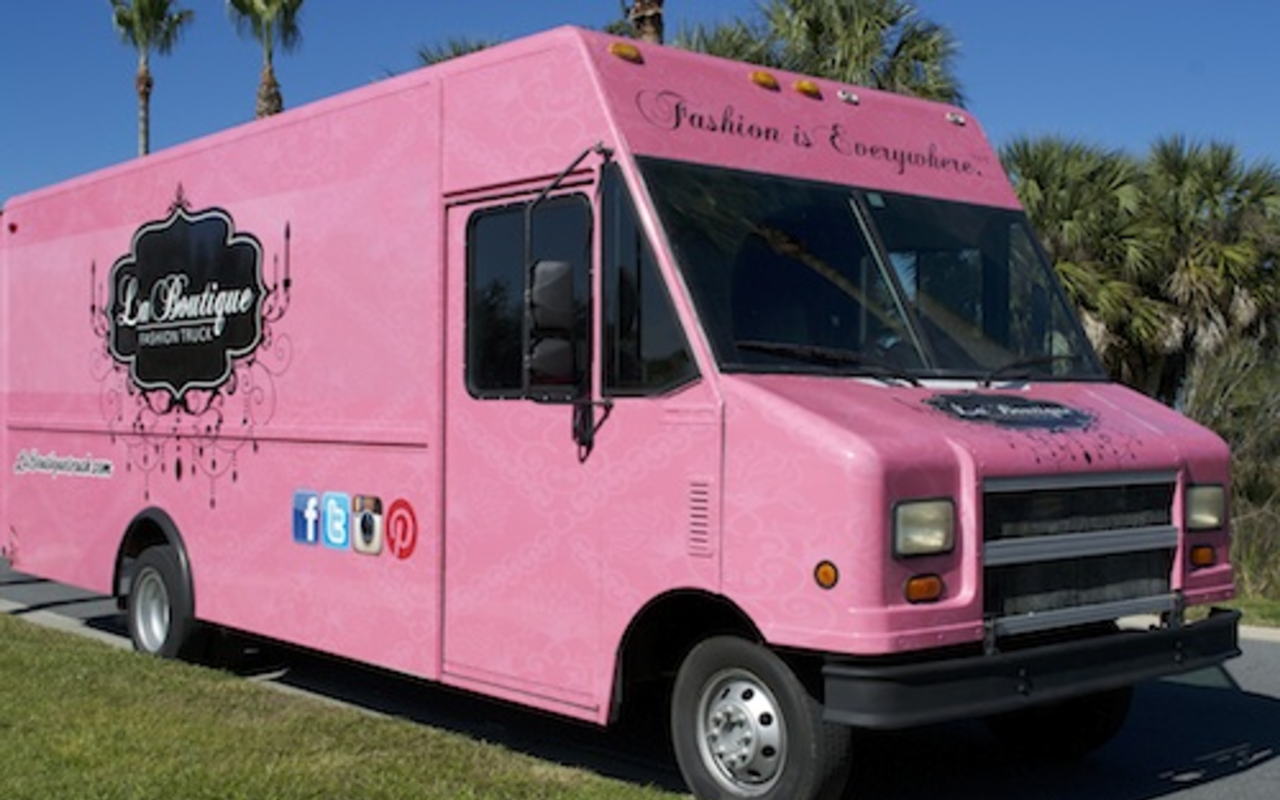 BIG PINK: La Boutique Fashion Truck attracts attention wherever it goes, and lures shoppers with one-of-a-kind accessories and a parlor-style interior.