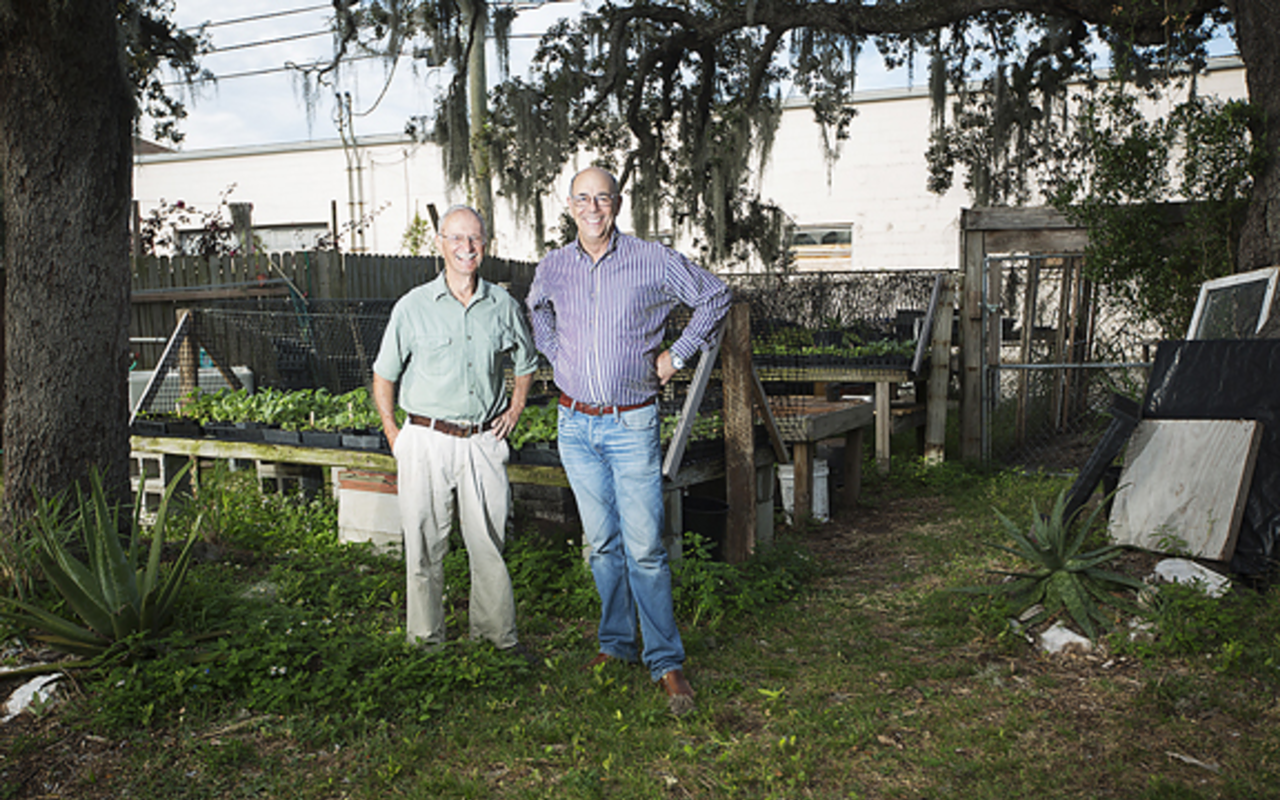 GARDEN PARTY: Chef Emmanuel Roux (right, with garden co-manager Bill Bilodeau) cultivates two organic community gardens and raises his own chickens.