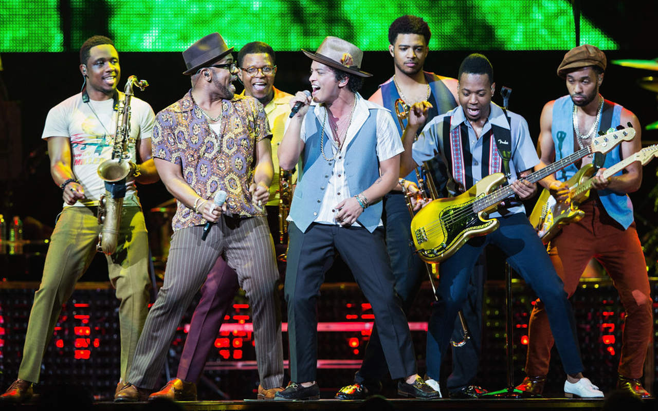 NO CAMERAS ALLOWED: This recent stage shot resembles the sporty-casual attire Bruno Mars and band wore in Tampa on Aug. 28.