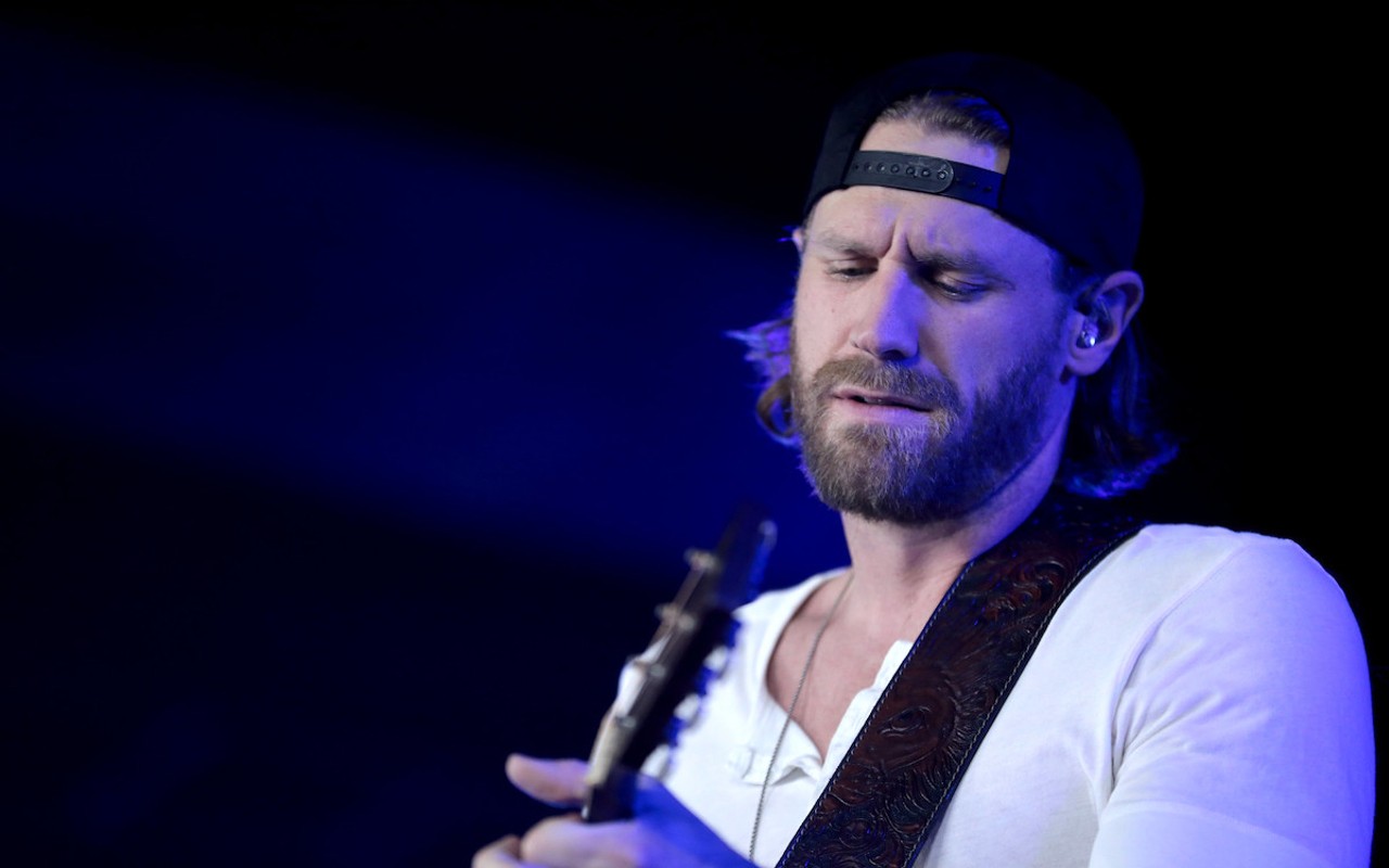 Chase Rice performing for attendees at the 2022 AmericaFest at the Phoenix Convention Center in Phoenix, Arizona.