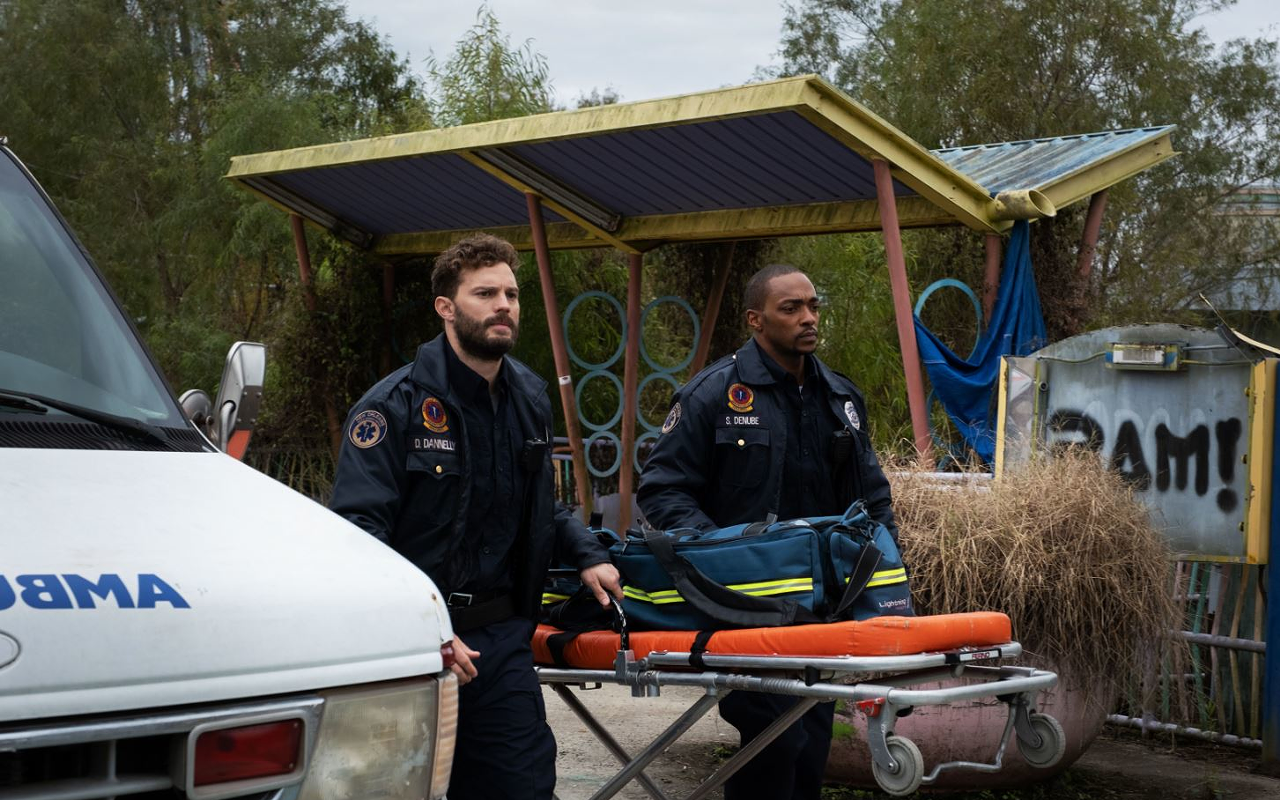 Paramedics Dennis, left, and Steve take care of New Orleans' wounded, and each other, but they aren't prepared for where "Synchronic" will take them.