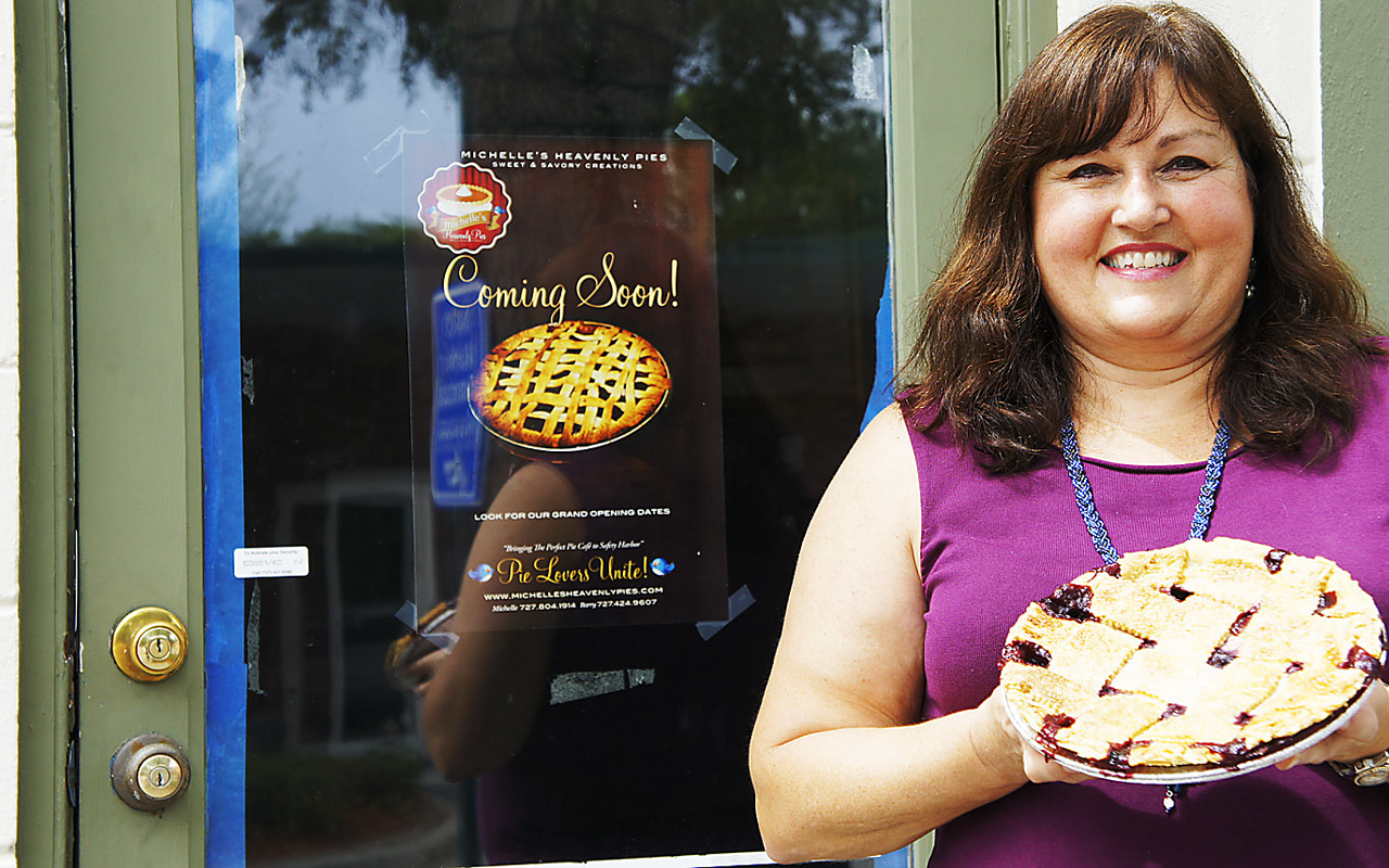 PIE DREAM: Michelle Stein holds a triple berry pie in front of her pie shop-in-progress in Safety Harbor.