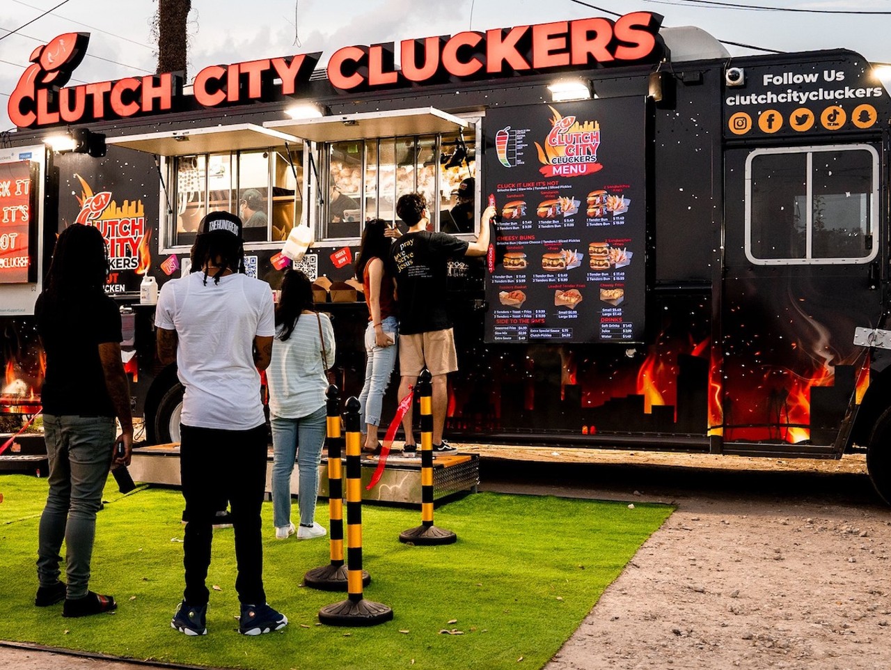 Clutch City Cluckers
2315 E Fletcher Ave., Tampa
A Texas chain that specializes in, you guessed it, Nashville hot chicken will debut its first Florida location in Tampa later this month. Clutch City Cluckers, named after the Houston Rockets' 1994 and 1995 NBA Championship runs, will open its permanent food truck spot on Sept. 27. Known for Nashville-inspired hot chicken, Cluck City's menu also spans cheese topped hot chicken sandwiches, chicken tenders, wings, shrimp tacos, salads, loaded fries, shakes, root beer floats, and more. Clutch City Cluckers was launched in Houston in 2021 by Ahmad Kilani, a native of Irbid, Jordan. The food truck chain has since expanded to 11 locations across Texas, Louisiana, and even one brick and mortar in Amman, Jordan.
Photo via Clutch City Cluckers/Facebook