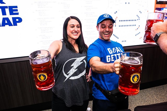Tampa Bay Lightning fans stein hoist during Bolts Brew Fest at Amalie Arena in Tampa, Florida on Aug. 11, 2023.