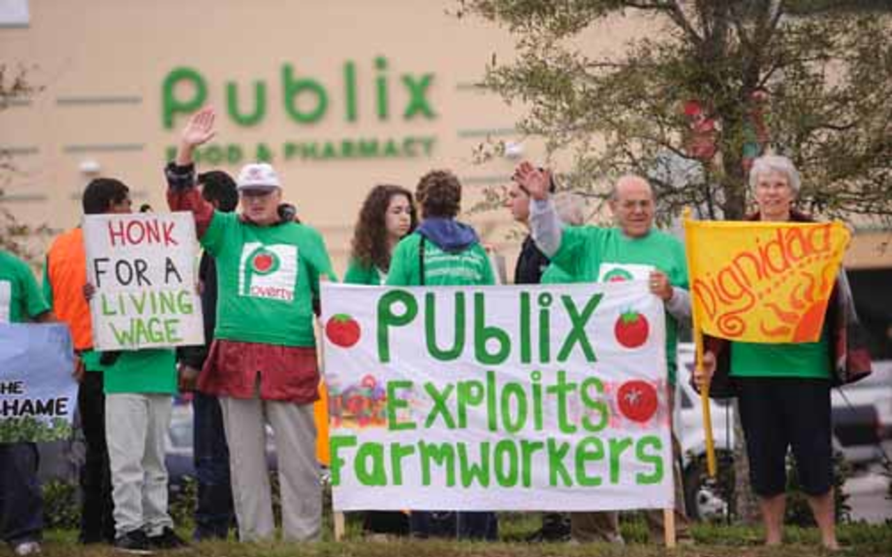 GOING PUBLIX: The Coalition of Immokalee Workers, seen here at a December protest, plan to march on Publix headquarters in Lakeland starting April 16.