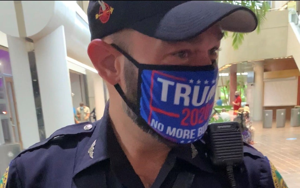 Florida police officer wears Donald Trump 'No More Bullshit" mask at voting site