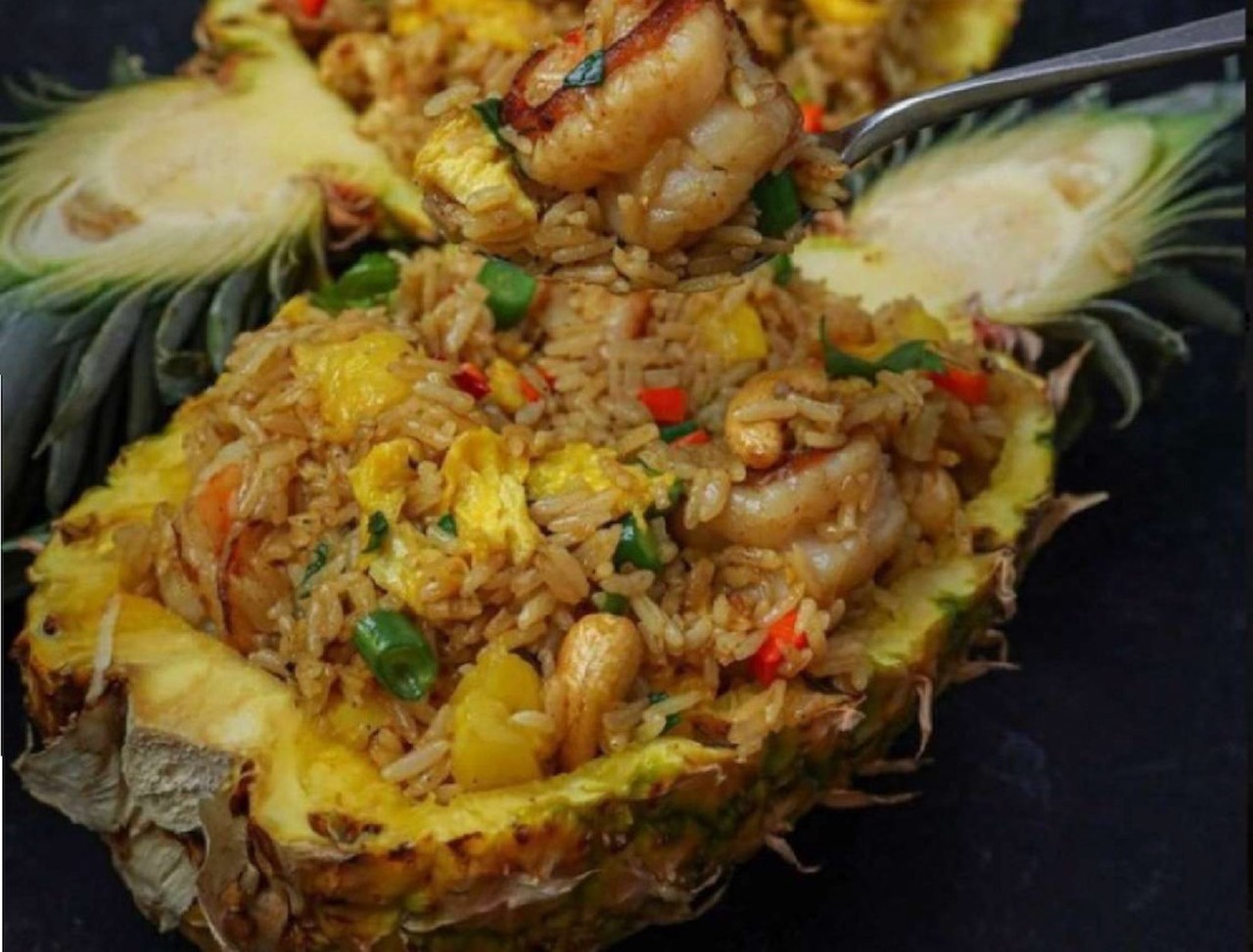 Pineapple Stir-Fried Rice Bowls           
"Fried-rice filled pineapple with your choice of steak, chicken or shrimp!"                      
Where to find it: Mobile Deserts & Foods