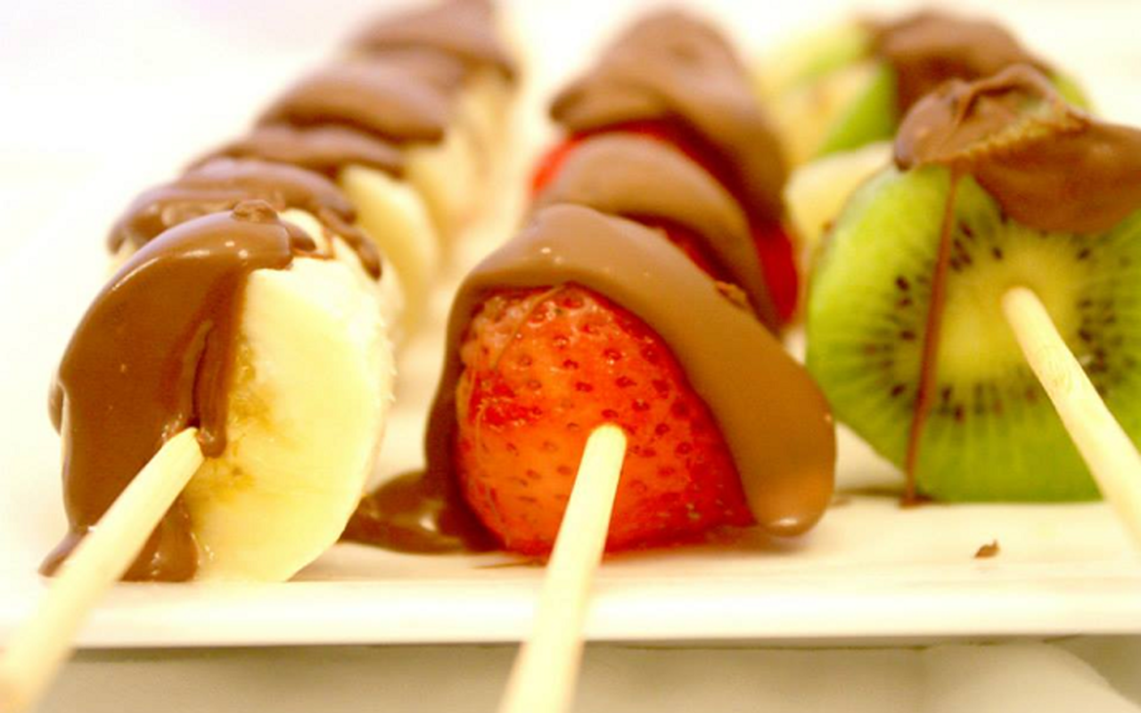 Fruit Fondue's "fruit sticks" come dipped in white or milk chocolate.
