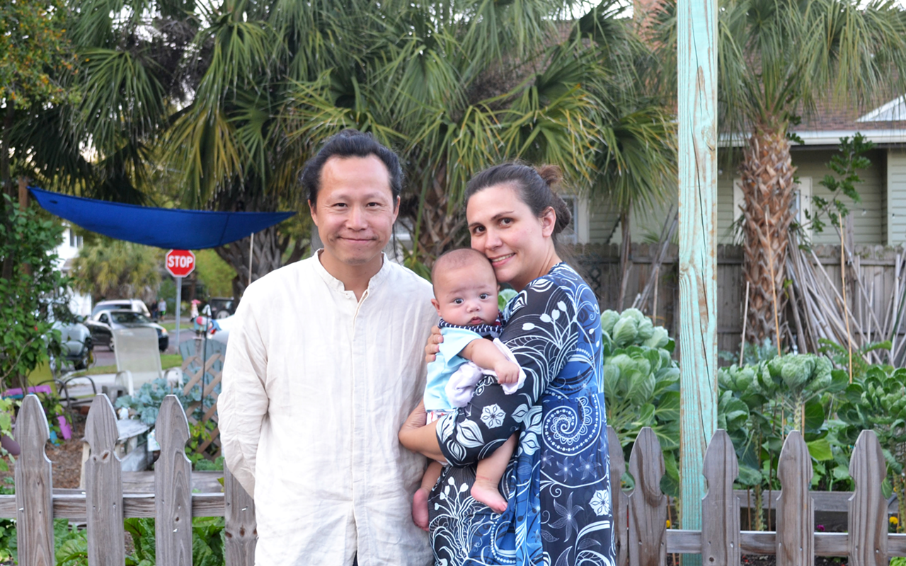 Oriental Zen Tea owners Jacky Lee and Kristin Johnson, with their son, David.