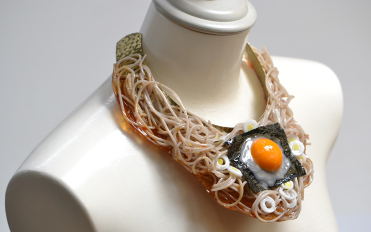 Sport this buckwheat noodle necklace, topped with an egg.