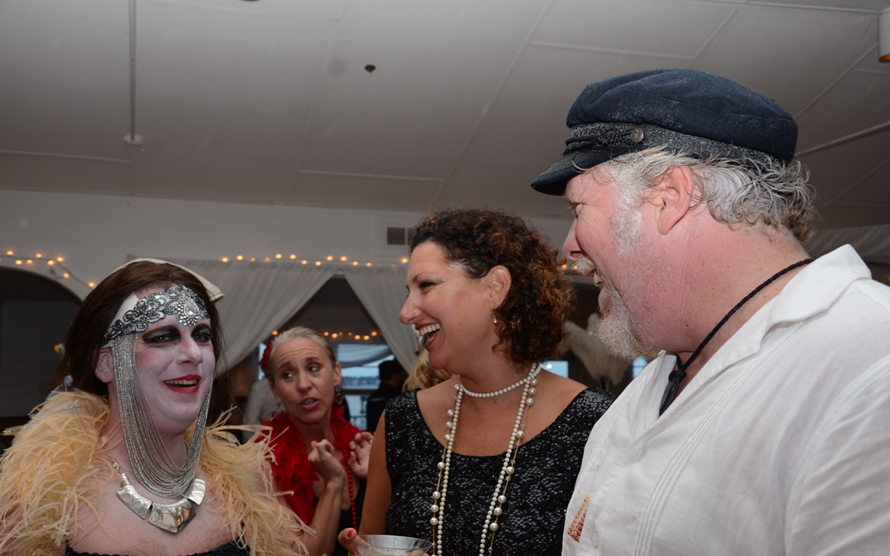 Mayor Sam Henderson and his wife Laura talk with last year's Gecko Queen at the 2014 Gecko Ball.