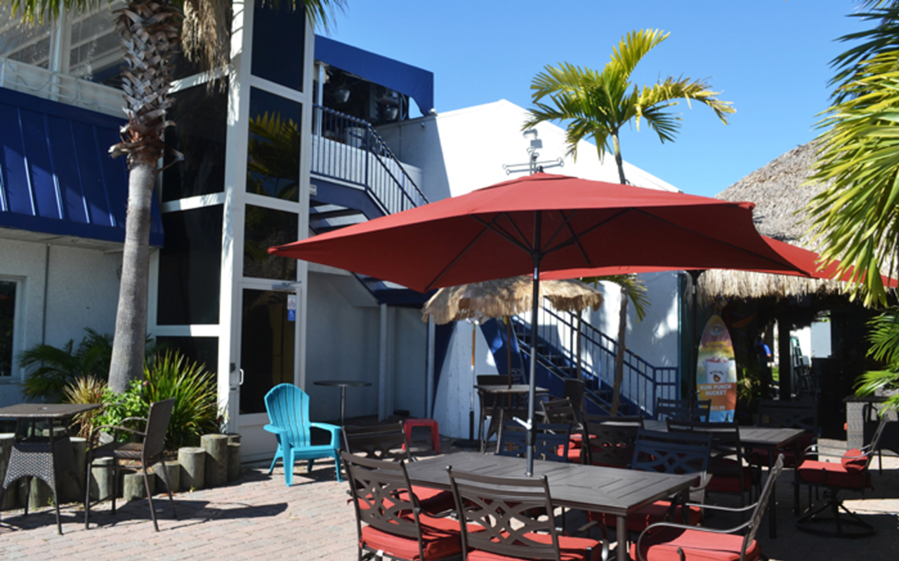 Spinnakers' patio is part of the outdoor tiki bar, one of its three themed bars.