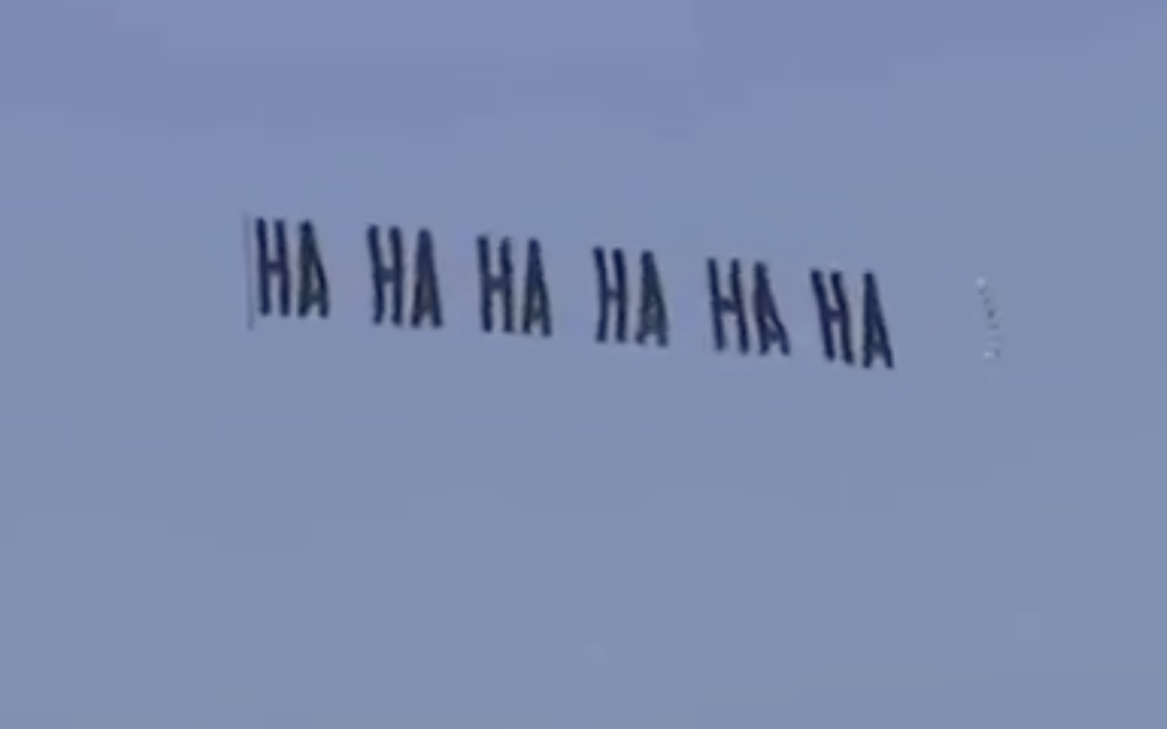 Banner flying over Trump's Mar-a-Lago estate reminds everyone that this is actually funny