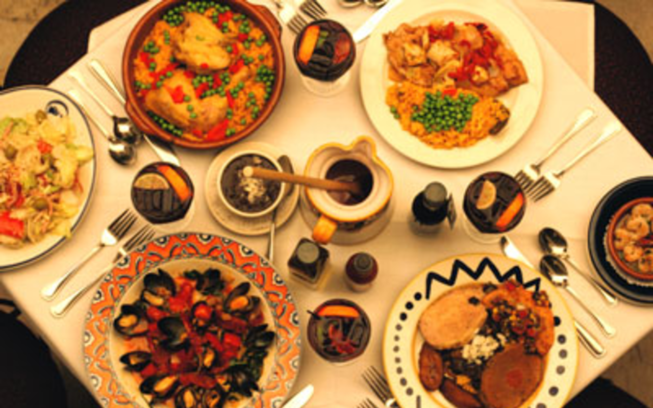 A MENU WITH MUSSEL: This Columbia Restaurant smorgasbord includes Scallops Casimiro, Shrimp Al Ajillo, mussels, 1905 Salad, Snapper Adelita, chicken and rice, black bean soup and sangria.