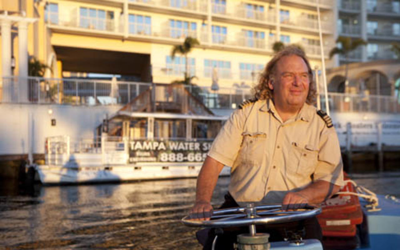 TAXI DRIVER: Laurence "Captain Larry" Salkin operates Tampa Water Taxi on the Hillsborough. "Even in these hard times," he says, "people still need to be entertained."