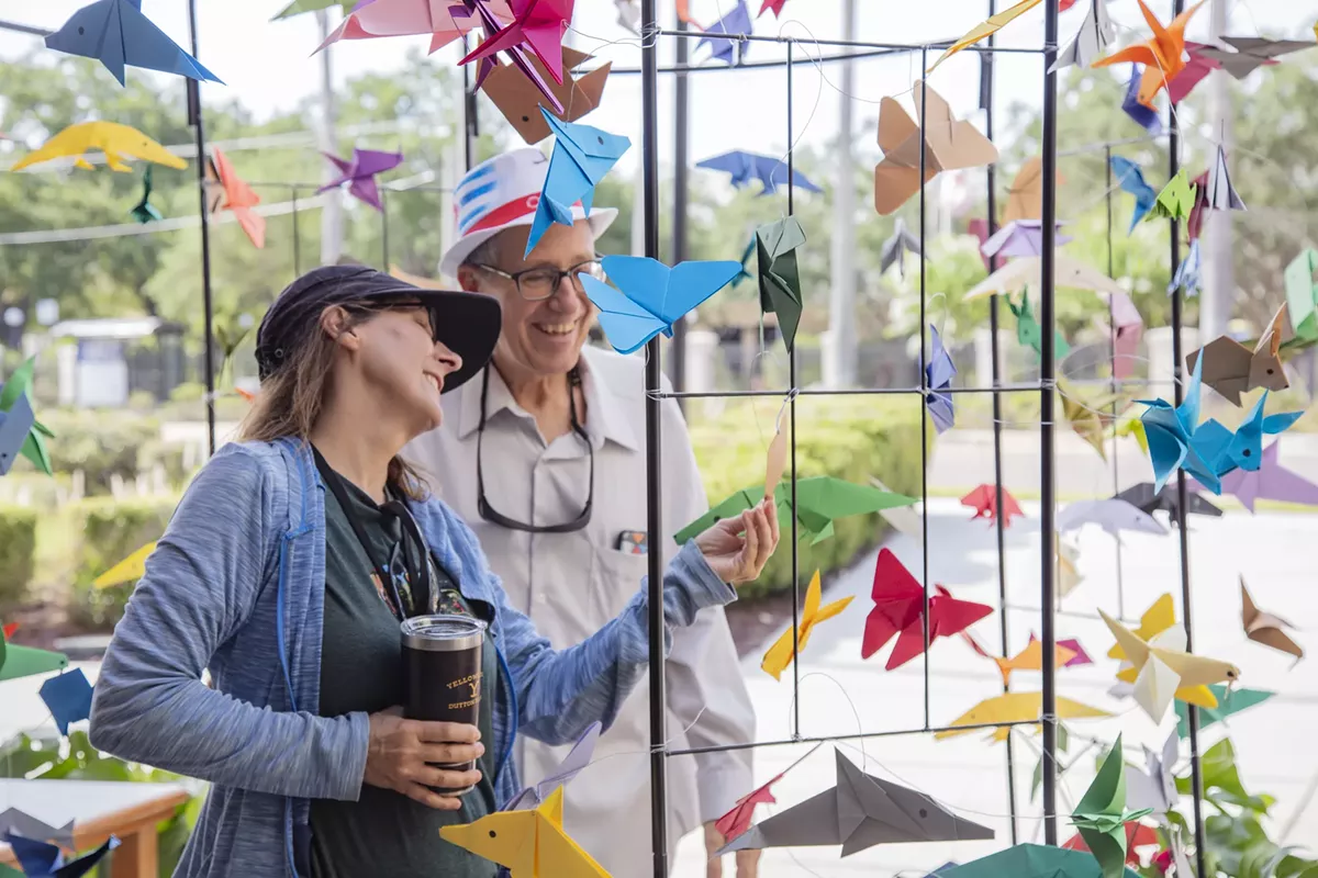 Tampanians interact with Samson Huang's art installation during the inaugural Now on View.