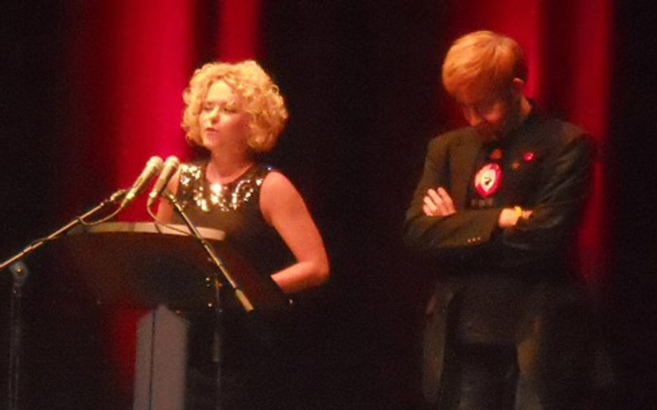Jobsite's Kari Goetz and David Jenkins present the Jobsite Honorary Award to Greta Man.