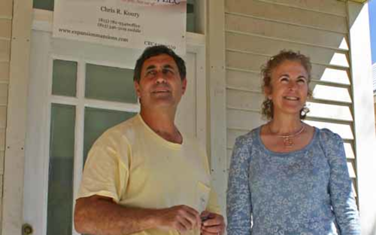Builder Chris Koury and wife Vicki Brittain at the home he's building in Ybor despite the possibility he might have to tear it down.