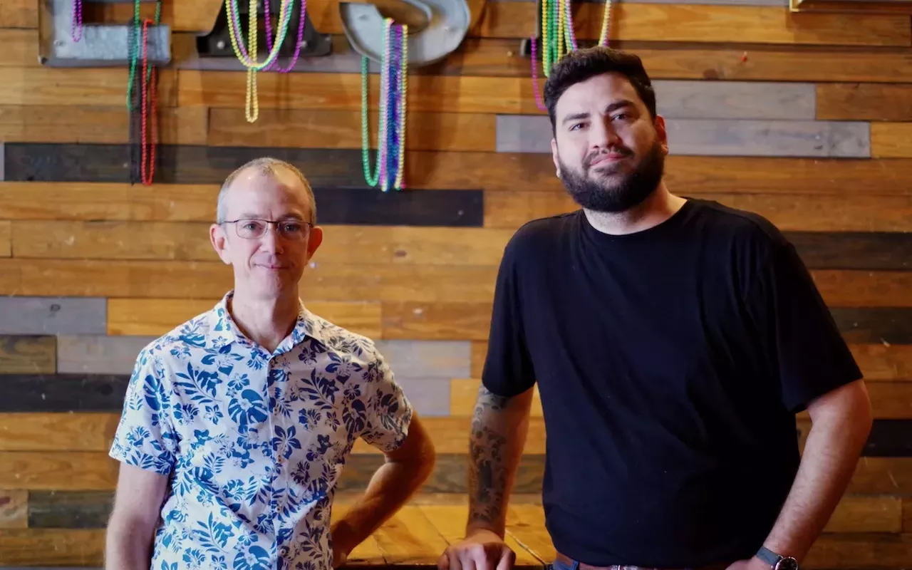 Dean Hurst (L) and Daniel Bareswilt inside Big Easy Bar in Ybor City, Florida.