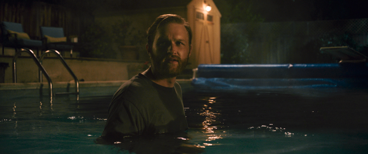 Wyatt Russell as Ray Waller in Night Swim, directed by Bryce McGuire.