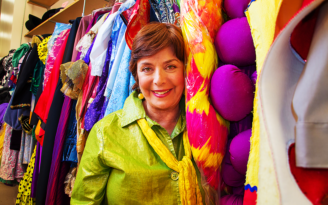 WARDROBE! Straz President/CEO Judy Lisi hangin' out in the facility's costume shop.