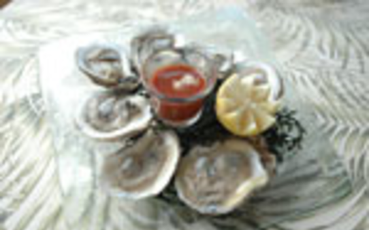 DON'T FORGET THE CRACKER: The raw oysters are fresh and perfect with a dab of Oystercatchers' simple cocktail sauce.